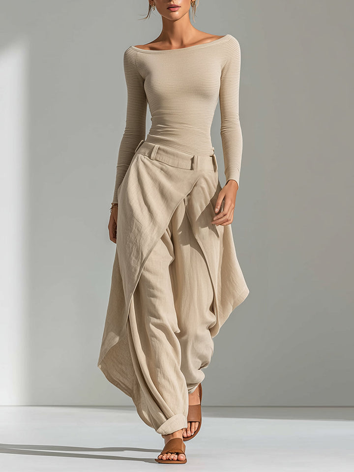 Set top beige a scollo a barca e pantaloni larghi a strati