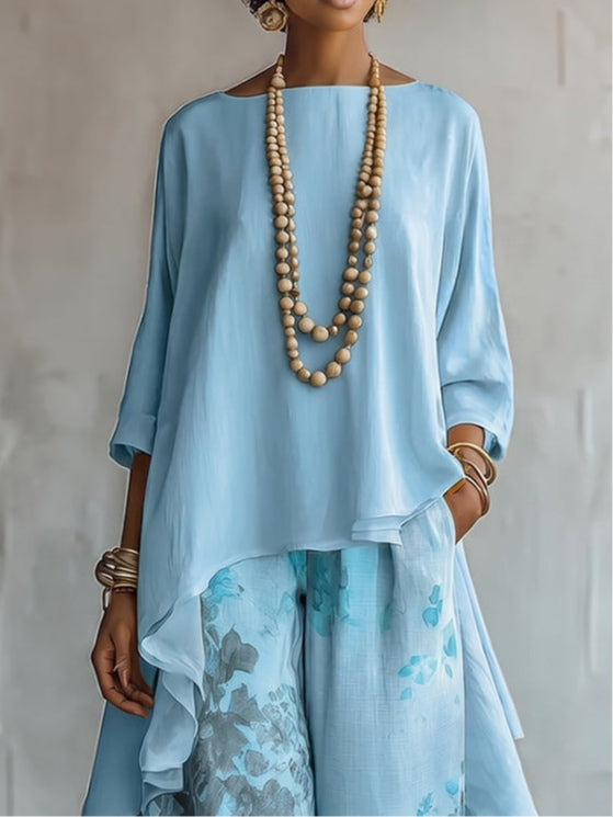 Set Top Asimmetrico Blu e Pantaloni a Gamba Larga con Fantasia