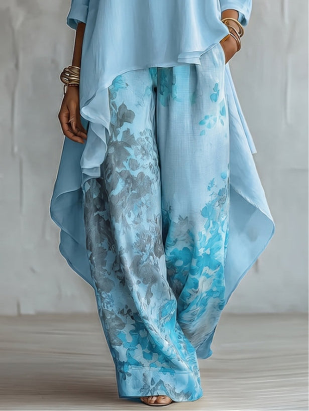 Set Top Asimmetrico Blu e Pantaloni a Gamba Larga con Fantasia