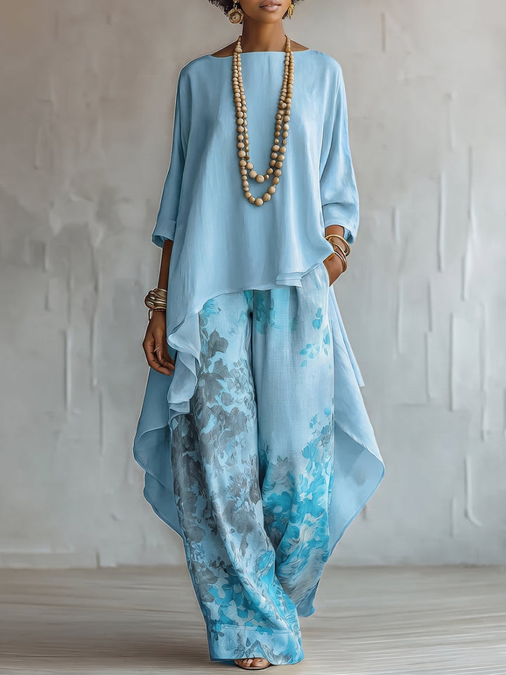 Set Top Asimmetrico Blu e Pantaloni a Gamba Larga con Fantasia