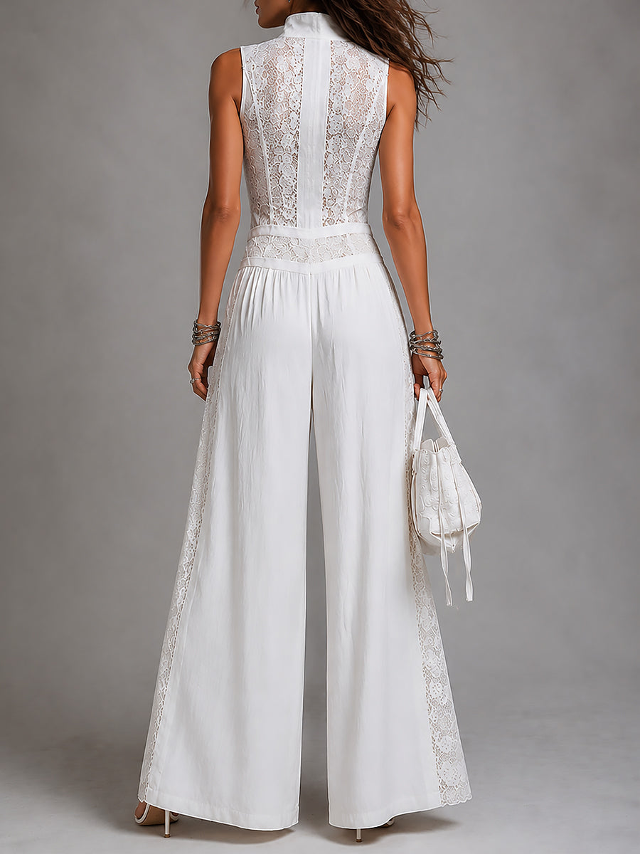 Jumpsuit vintage con colletto alto e gamba larga con pannelli in pizzo