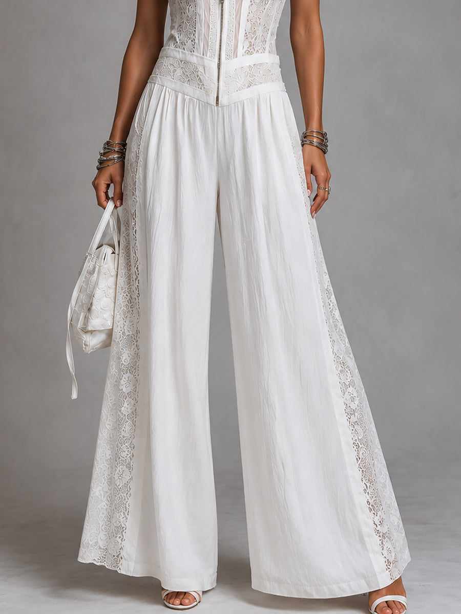 Jumpsuit vintage con colletto alto e gamba larga con pannelli in pizzo