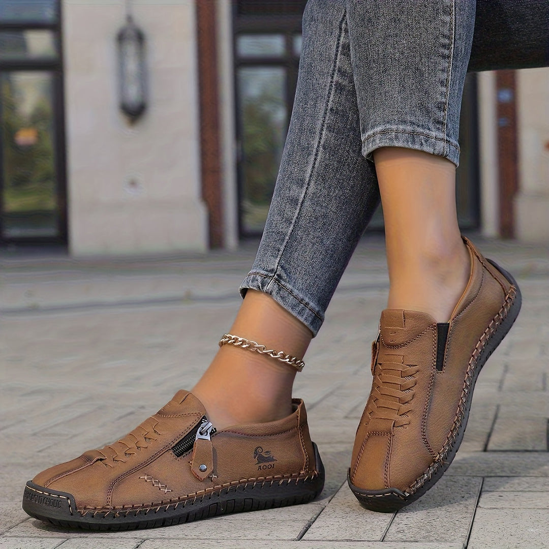 Nila – Comfort elegante con pratico zip