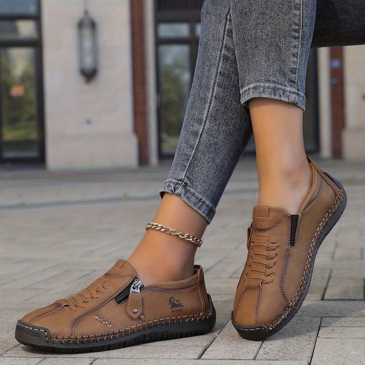 Nila – Comfort elegante con pratico zip