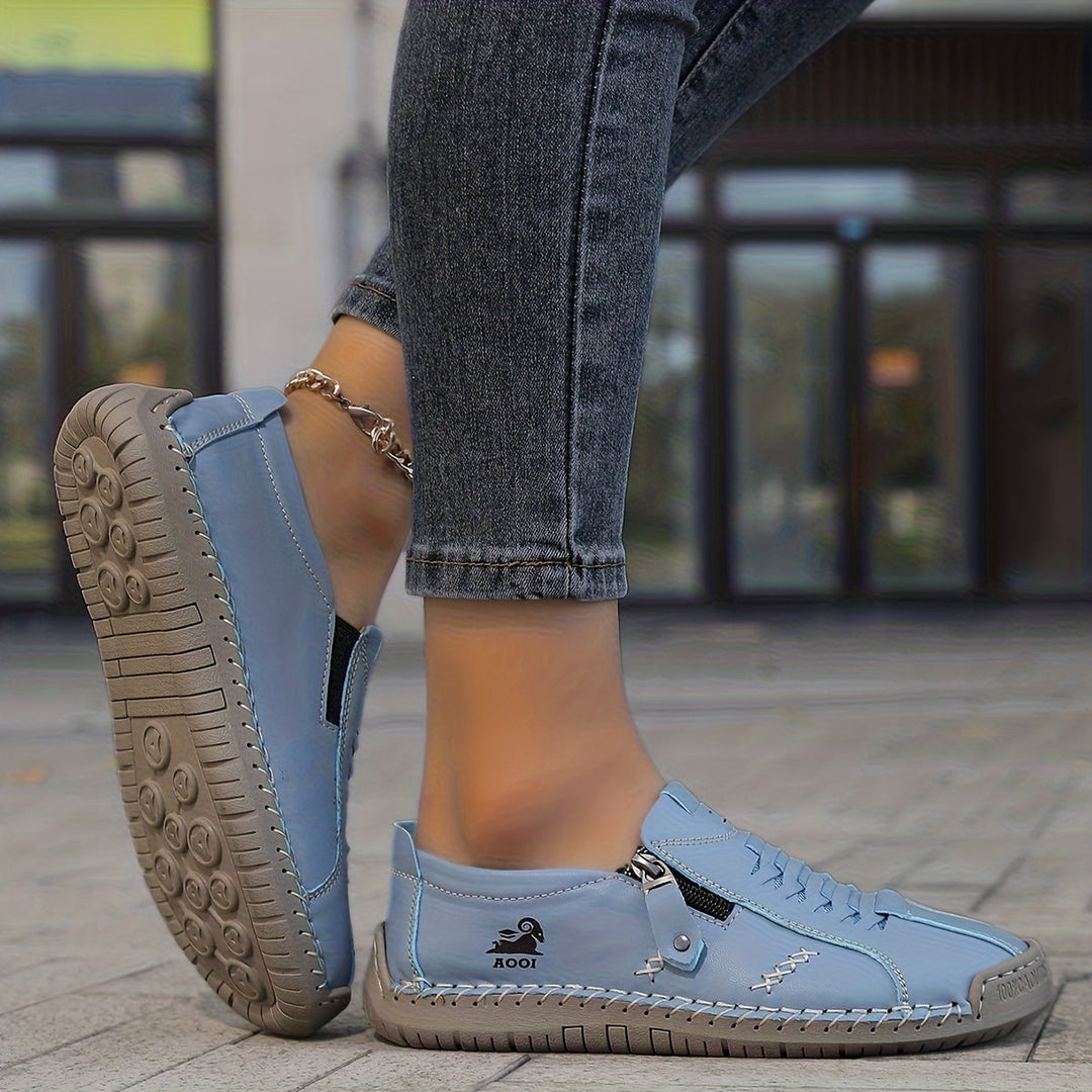 Nila – Comfort elegante con pratico zip