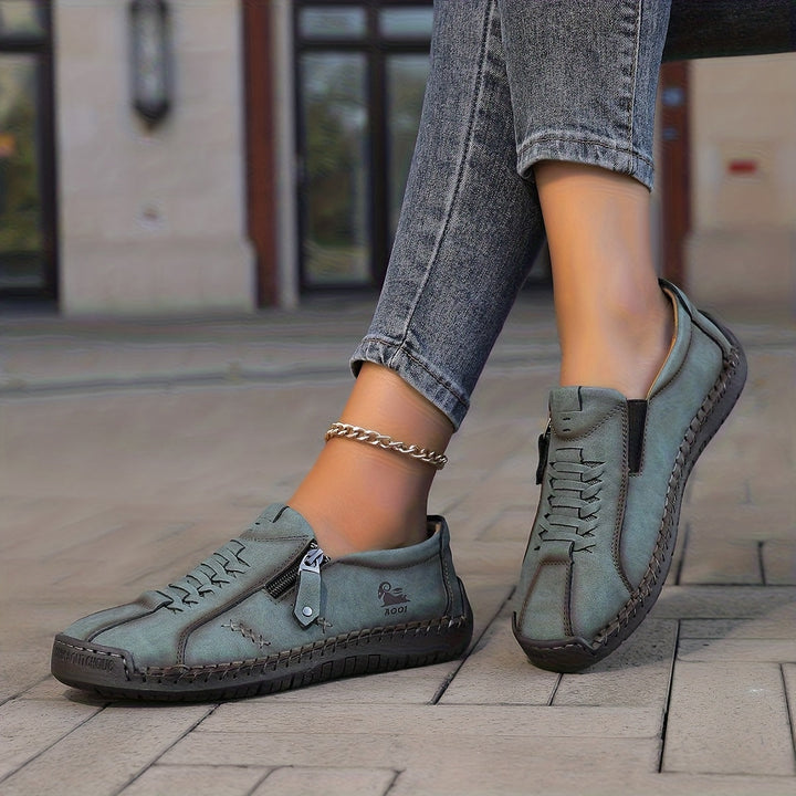 Nila – Comfort elegante con pratico zip