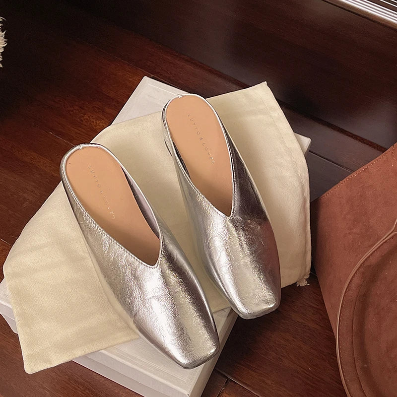 Lyra | Mules stilizzati