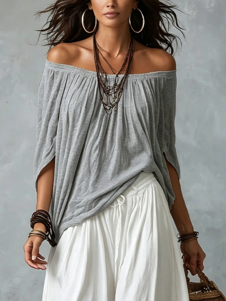 Top Grigio Off-shoulder e Pantaloni Lantern Bianchi Comodi
