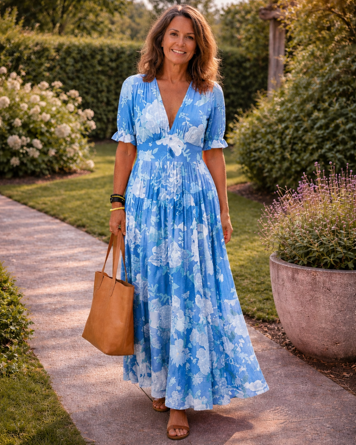 Ione | Abito midi floreale senza maniche con scollatura a V